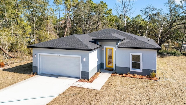 view of front of property featuring a garage