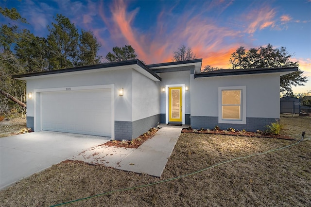 view of front of home featuring a garage