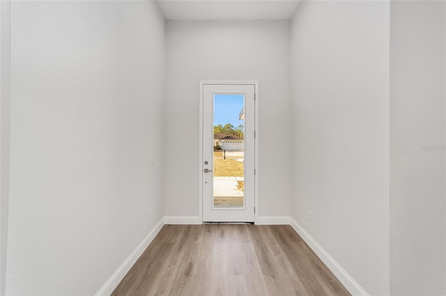 doorway featuring light hardwood / wood-style floors