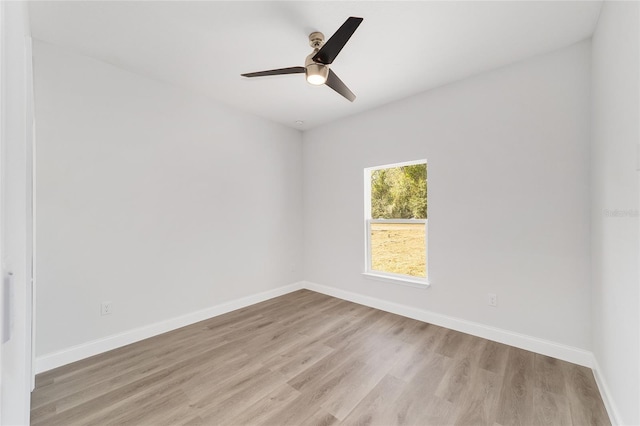 unfurnished room with ceiling fan and light hardwood / wood-style flooring