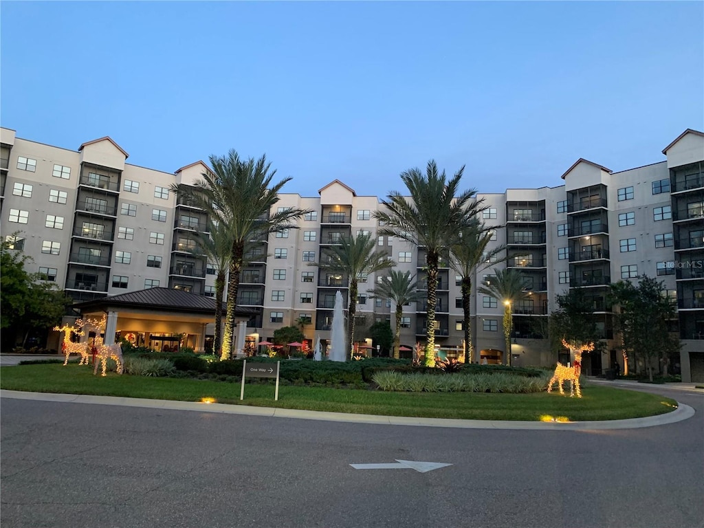 view of outdoor building at dusk