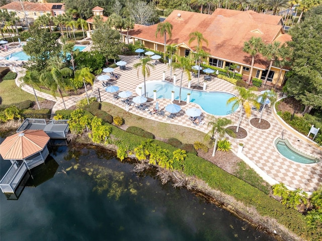 birds eye view of property featuring a water view