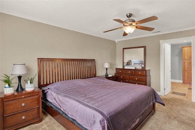 bedroom featuring ceiling fan, light colored carpet, and ornamental molding