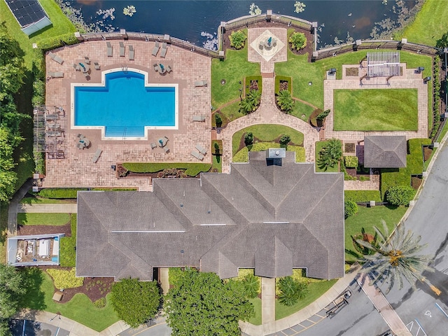 birds eye view of property featuring a water view