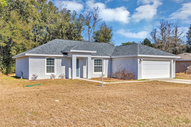 ranch-style house featuring a garage and a front lawn