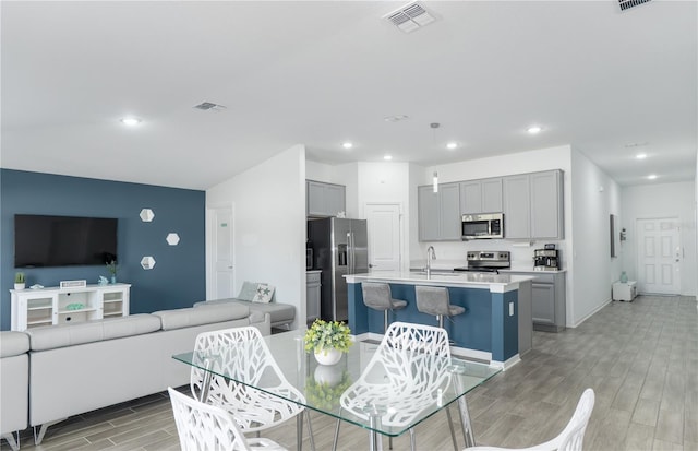 dining space featuring sink