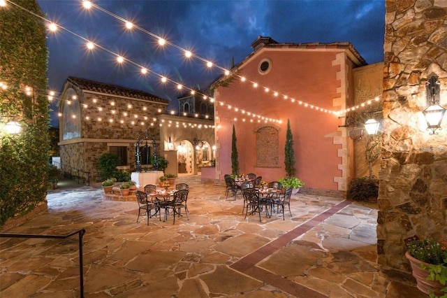 view of patio at night