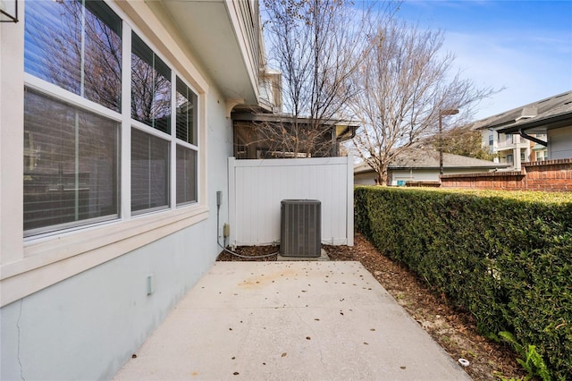 exterior space featuring cooling unit and a patio