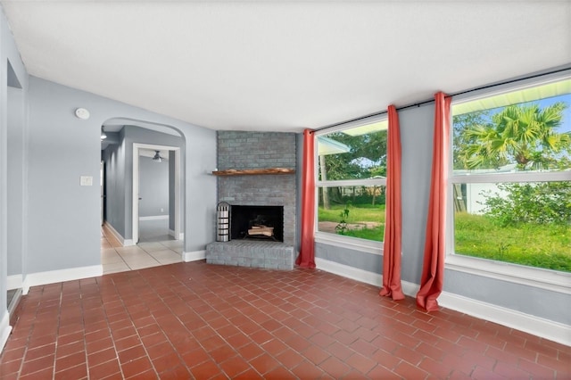 unfurnished living room with a fireplace