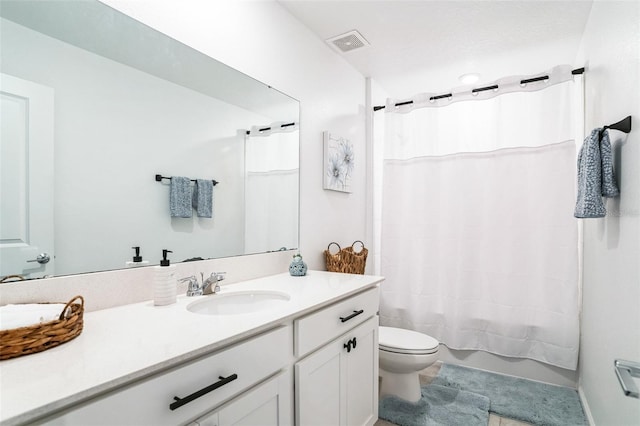 full bathroom featuring vanity, toilet, and shower / bath combo with shower curtain