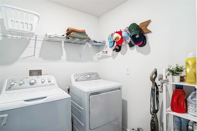 laundry area featuring washing machine and dryer