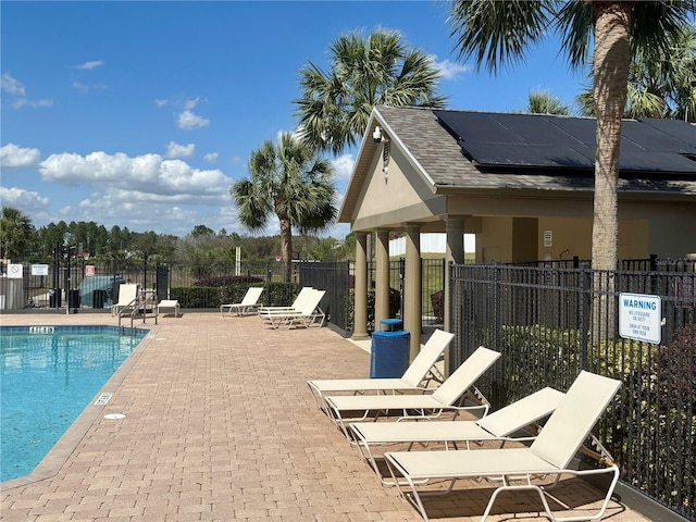 525 Aster Dr, Davenport, FL 33897 - community pool featuring fence and a patio area