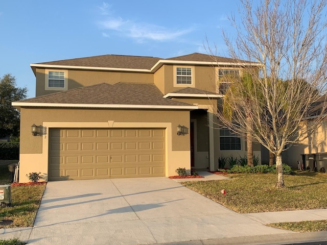 view of front of house with a garage