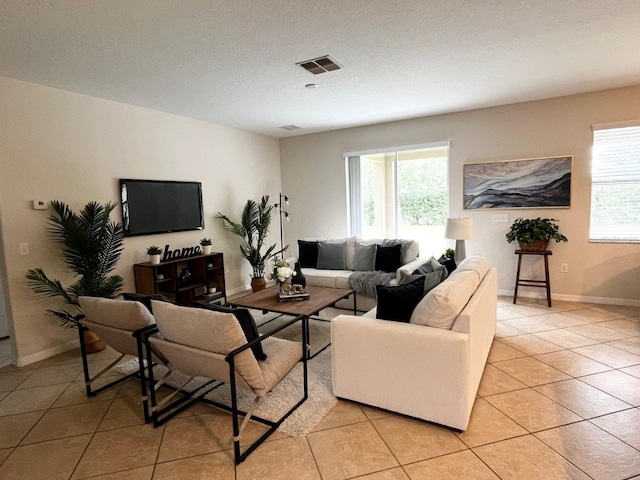 living room featuring light tile patterned flooring