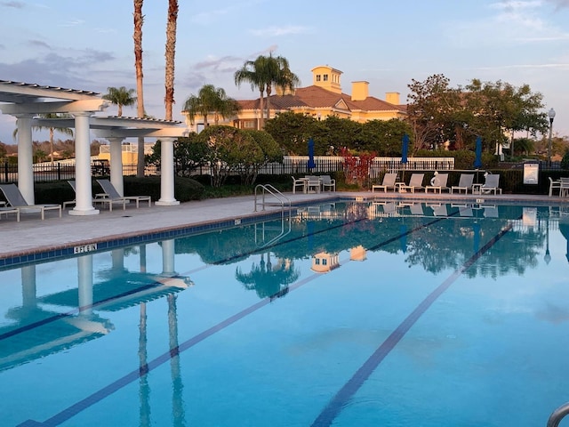 view of pool featuring a pergola and a patio area