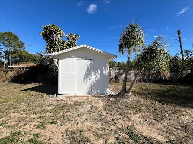 view of outdoor structure featuring a yard