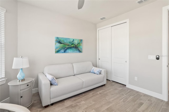 living room featuring ceiling fan