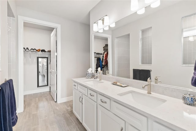 bathroom featuring vanity and wood-type flooring