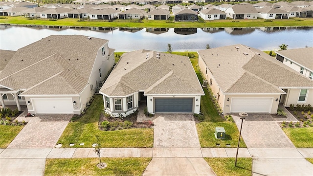 drone / aerial view featuring a water view