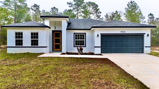 view of front facade with a garage, concrete driveway, stucco siding, roof with shingles, and a front yard