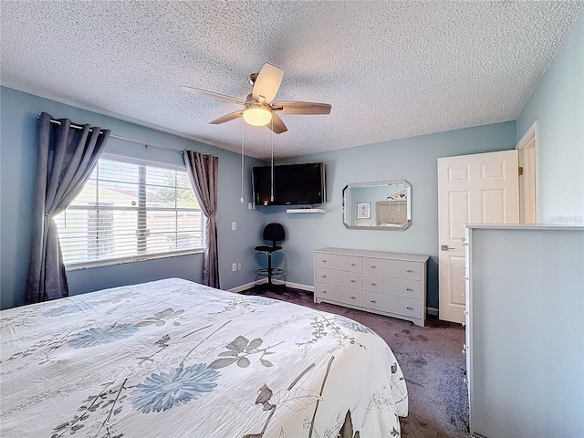 carpeted bedroom featuring a textured ceiling and ceiling fan