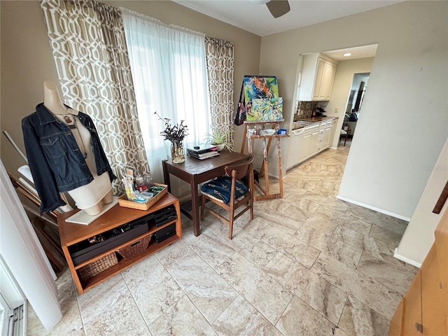 dining room featuring ceiling fan