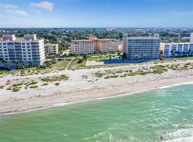 aerial view with a view of the beach and a water view