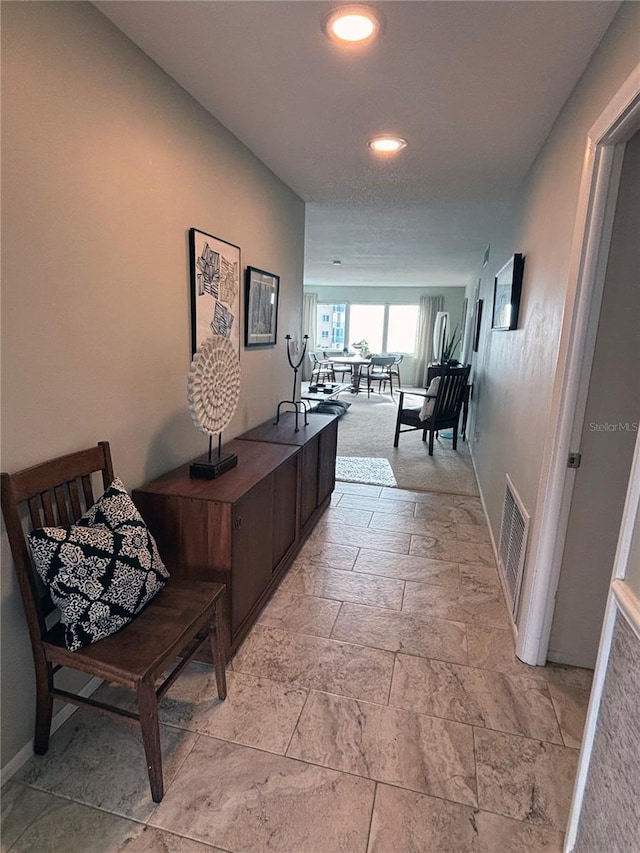 500 The Esplanade N Unit 405, Venice, FL 34285 - hall with recessed lighting and visible vents