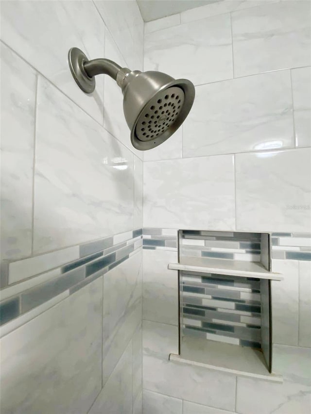 500 The Esplanade N Unit 405, Venice, FL 34285 - interior details with a tile shower