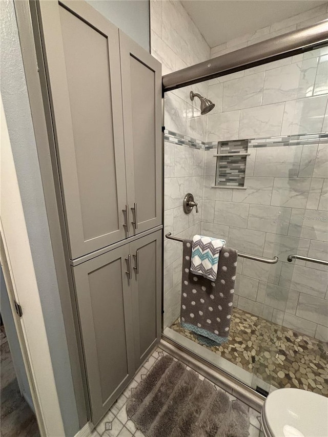500 The Esplanade N Unit 405, Venice, FL 34285 - full bath featuring toilet and a stall shower
