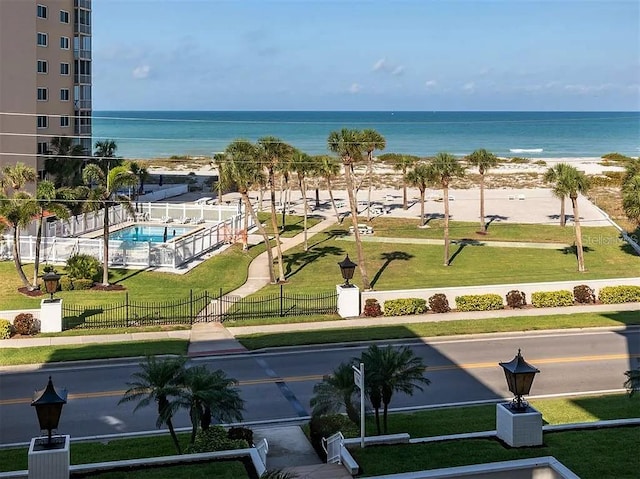 500 The Esplanade N Unit 405, Venice, FL 34285 - view of community with a yard, a water view, and fence