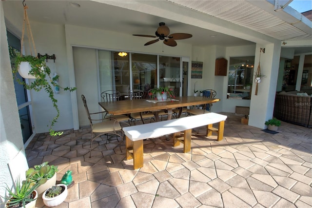 view of patio / terrace featuring outdoor dining space and ceiling fan