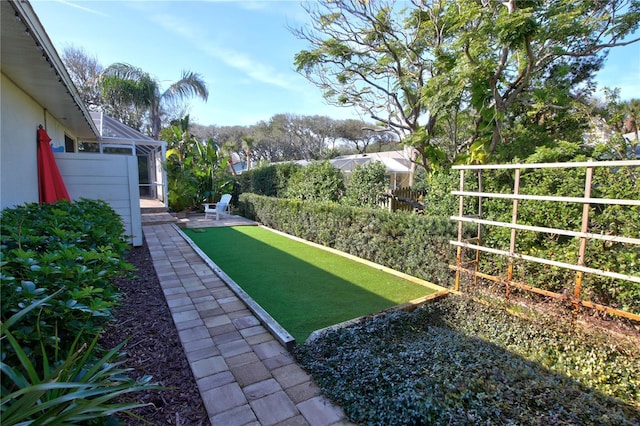 view of yard featuring fence