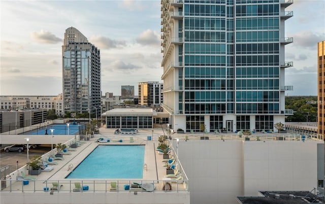 view of swimming pool featuring a patio area