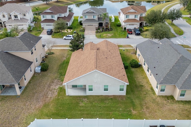 bird's eye view with a water view