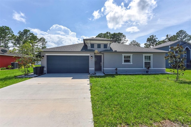 view of front of property featuring central AC, a garage, and a front lawn