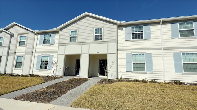 view of front of house with a front lawn