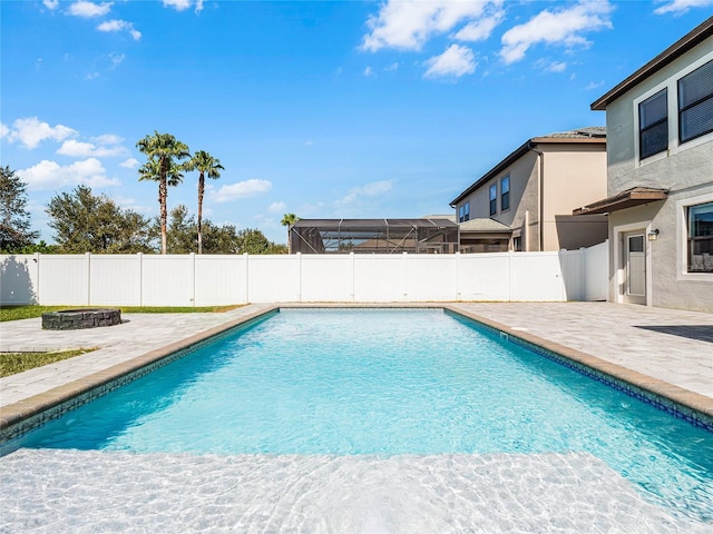 view of swimming pool featuring a patio