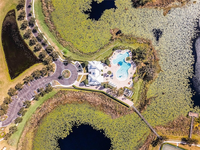 bird's eye view with a water view