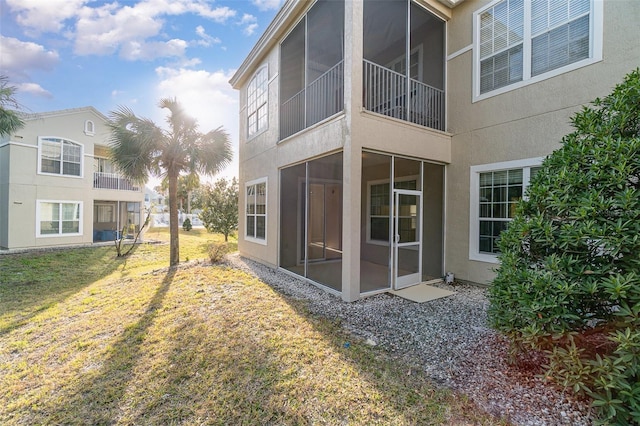 view of property exterior featuring a yard