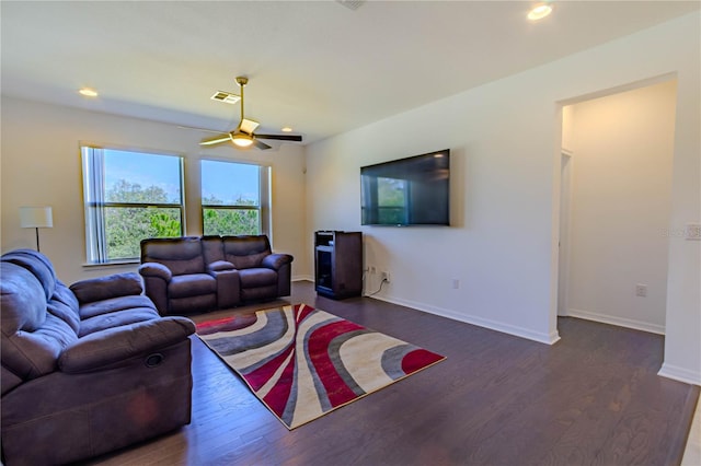 living room with baseboards, visible vents, a ceiling fan, wood finished floors, and recessed lighting