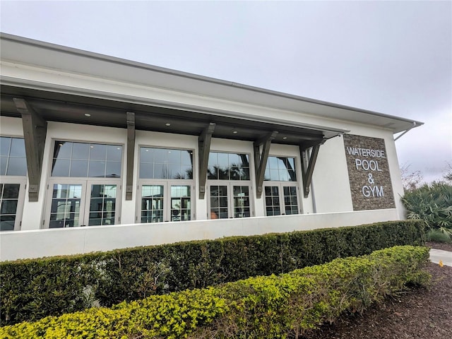 exterior space featuring stucco siding