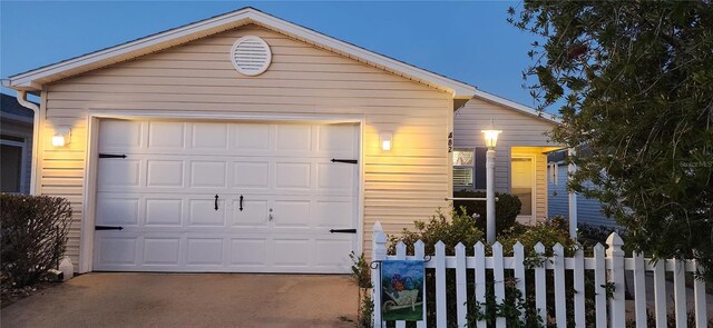 482 Hildalgo Dr, The Villages, FL 32159 - view of front facade with fence and driveway