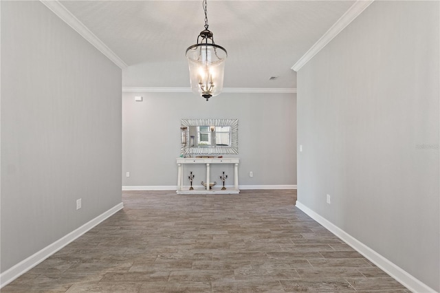 4608 Egg Harbor Dr, Kissimmee, FL 34746 - unfurnished dining area with hardwood / wood-style floors, a notable chandelier, and ornamental molding