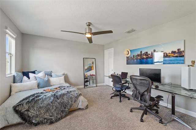 4608 Egg Harbor Dr, Kissimmee, FL 34746 - carpeted bedroom with ceiling fan and a textured ceiling