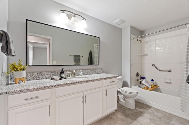4608 Egg Harbor Dr, Kissimmee, FL 34746 - full bathroom featuring shower / tub combo with curtain, vanity, a textured ceiling, tile patterned floors, and toilet