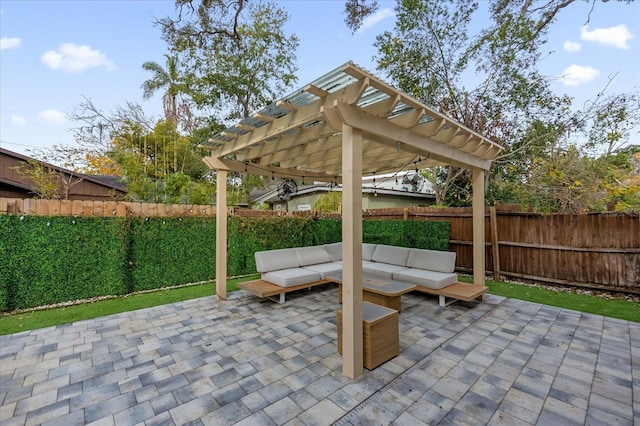 view of patio featuring an outdoor living space and a pergola