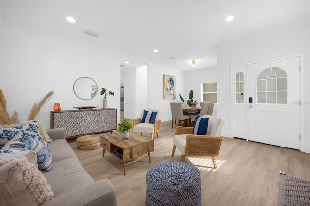 living room with light hardwood / wood-style flooring