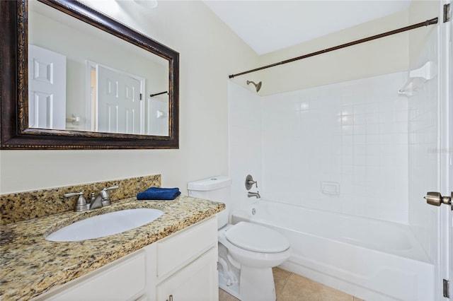 bathroom with toilet, tile patterned floors,  shower combination, and vanity