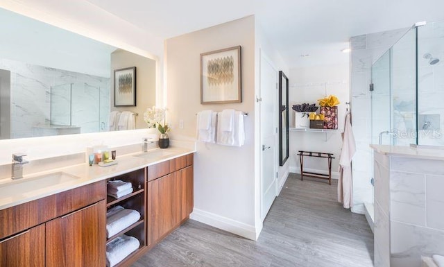 bathroom featuring vanity, hardwood / wood-style floors, and walk in shower